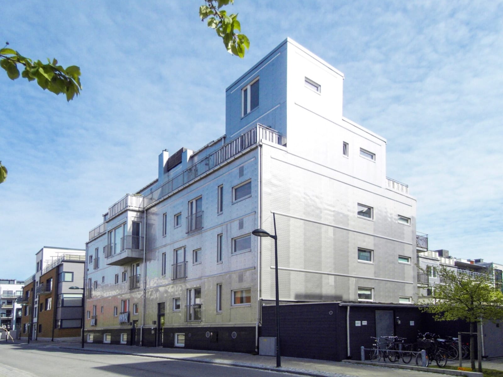 A metal building exterior showing corrugated steel panel construction