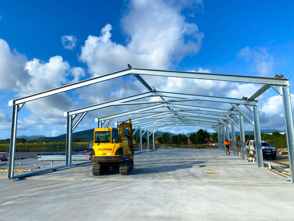 Steel portal frames being erected for an industrial shed structure